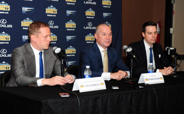 Denver Nuggets head coach Michael Malone (center) and general manager GM Tim Connelly (left) and president Josh Kroenke (right) during a press conference at the Pepsi Center.