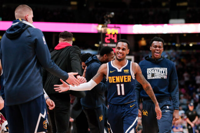 Denver Nuggets guard Monte Morris (11) reacts in the fourth quarter against the Sacramento Kings at the Pepsi Center.