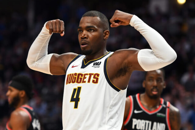 Denver Nuggets forward Paul Millsap (4) reacts following a basket and foul in the third quarter against the Portland Trail Blazers in game five of the second round of the 2019 NBA Playoffs at Pepsi Center.