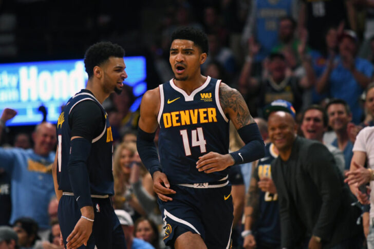 Denver Nuggets guard Gary Harris (14) celebrates a score with guard Jamal Murray (27) in the first quarter against the Portland Trail Blazers in game seven of the second round of the 2019 NBA Playoffs at Pepsi Center.
