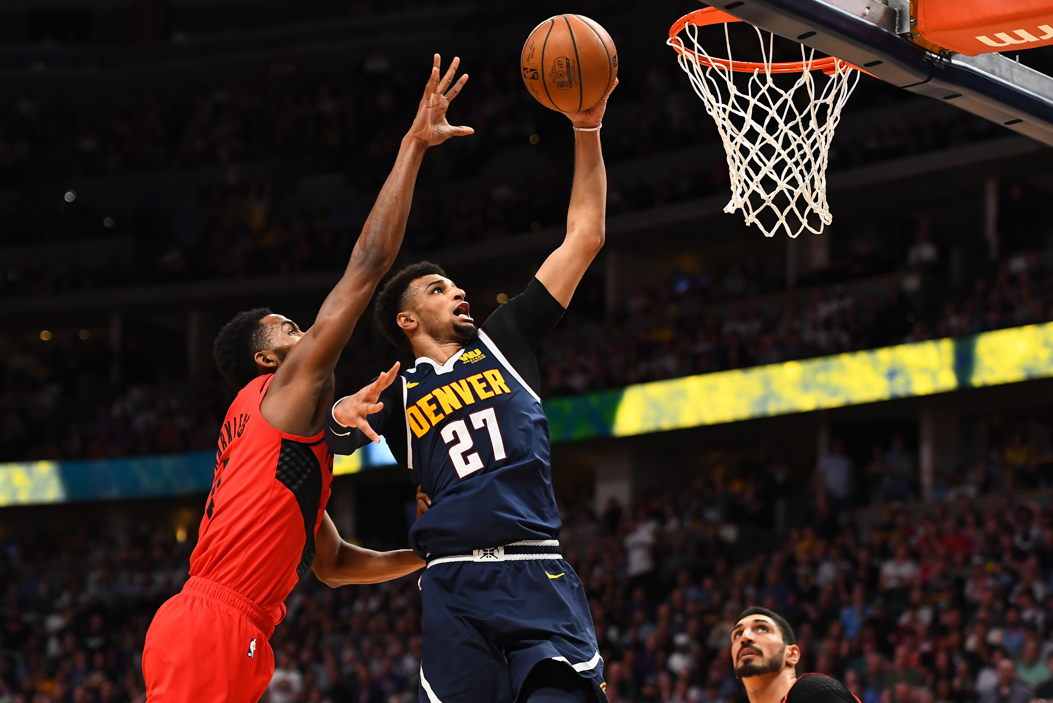 NBA: Playoffs-Portland Trail Blazers at Denver Nuggets Denver Nuggets guard Jamal Murray (27) shoots past Portland Trail Blazers forward Maurice Harkless (4) in the second half in the second round of the 2019 NBA Playoffs at Pepsi Center.