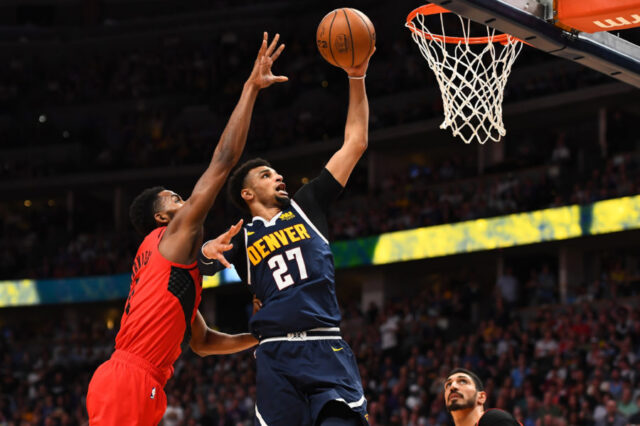 Denver Nuggets guard Jamal Murray (27) shoots past Portland Trail Blazers forward Maurice Harkless (4) in the second half in the second round of the 2019 NBA Playoffs at Pepsi Center.