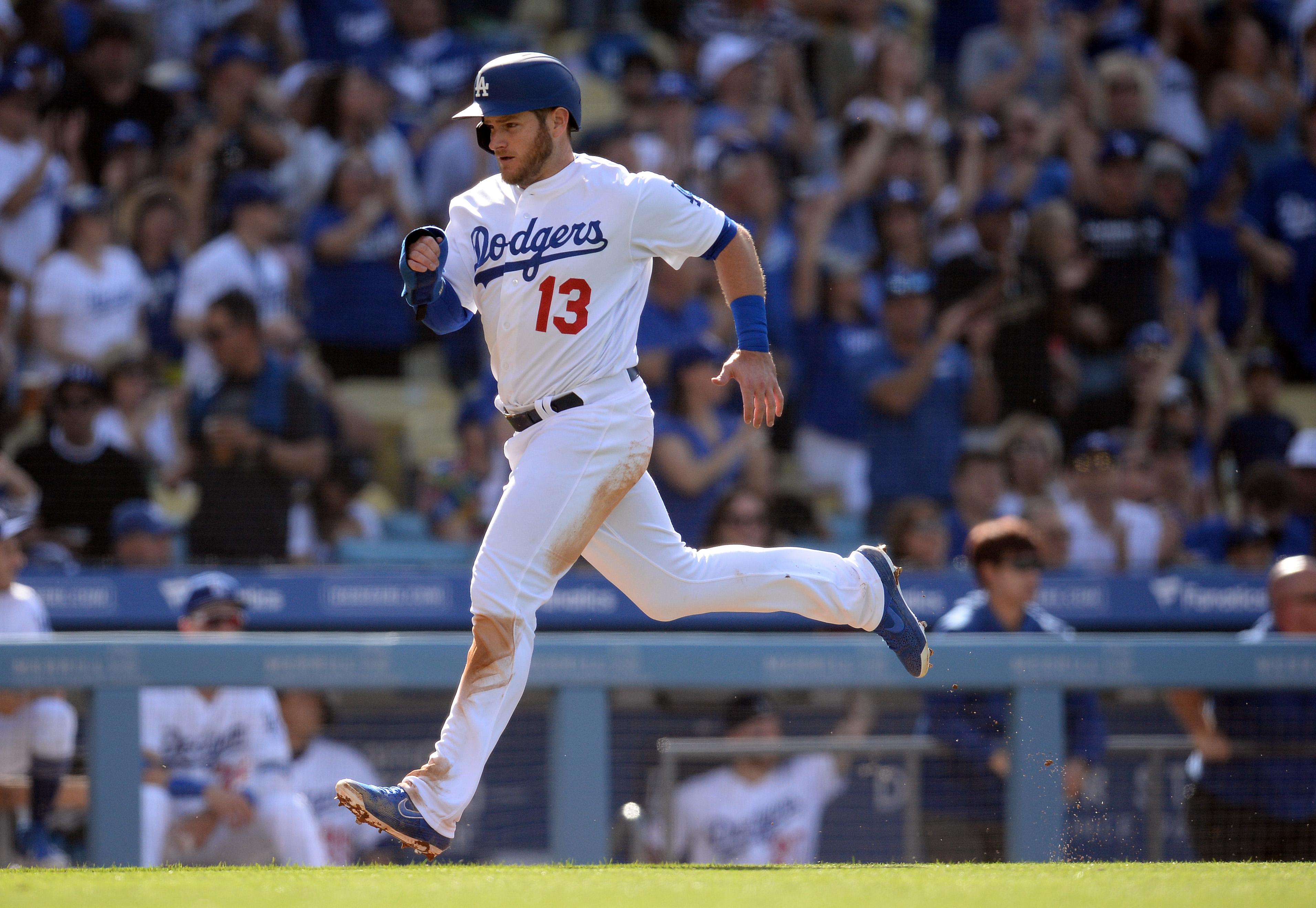 Fan runs onto field during Dodgers game to hug Cody Bellinger