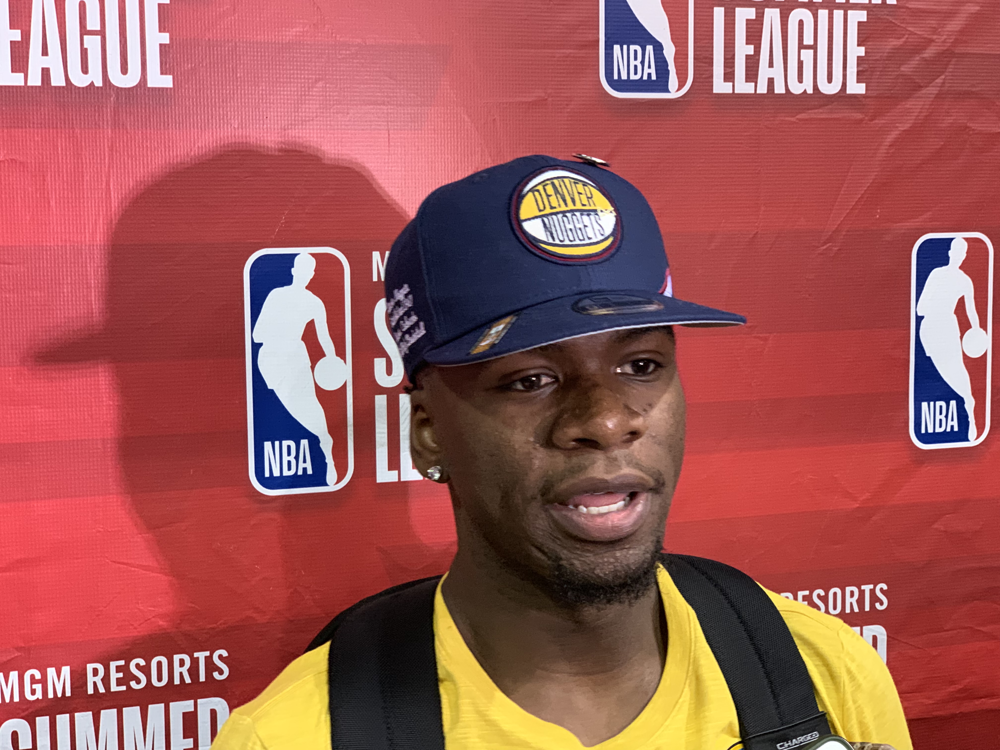 Terence Davis speaks to the media after Denver's summer league victory over Orlando.