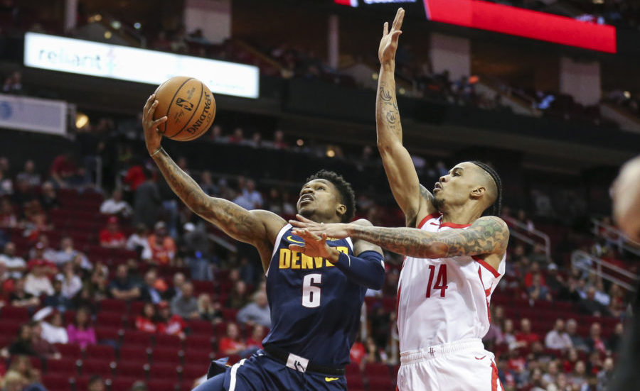 Denver Nuggets guard Brandon Goodwin (6) shoots against Houston Rockets guard Gerald Green (14) during the fourth quarter at Toyota Center.