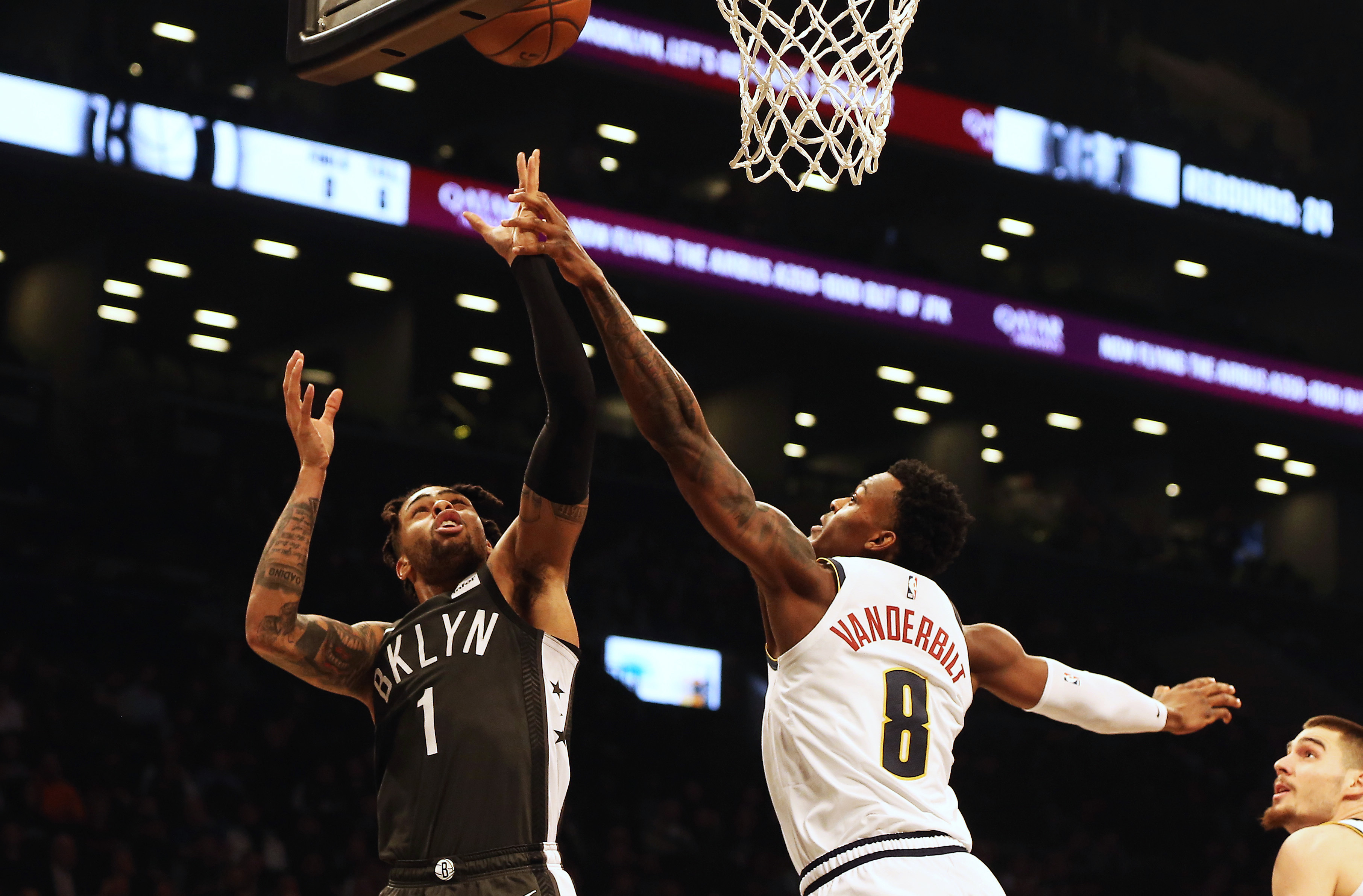 NBA: Denver Nuggets at Brooklyn Nets Brooklyn Nets guard D'Angelo Russell (1) shoots against Denver Nuggets forward Jarred Vanderbilt (8) during the second half at Barclays Center.