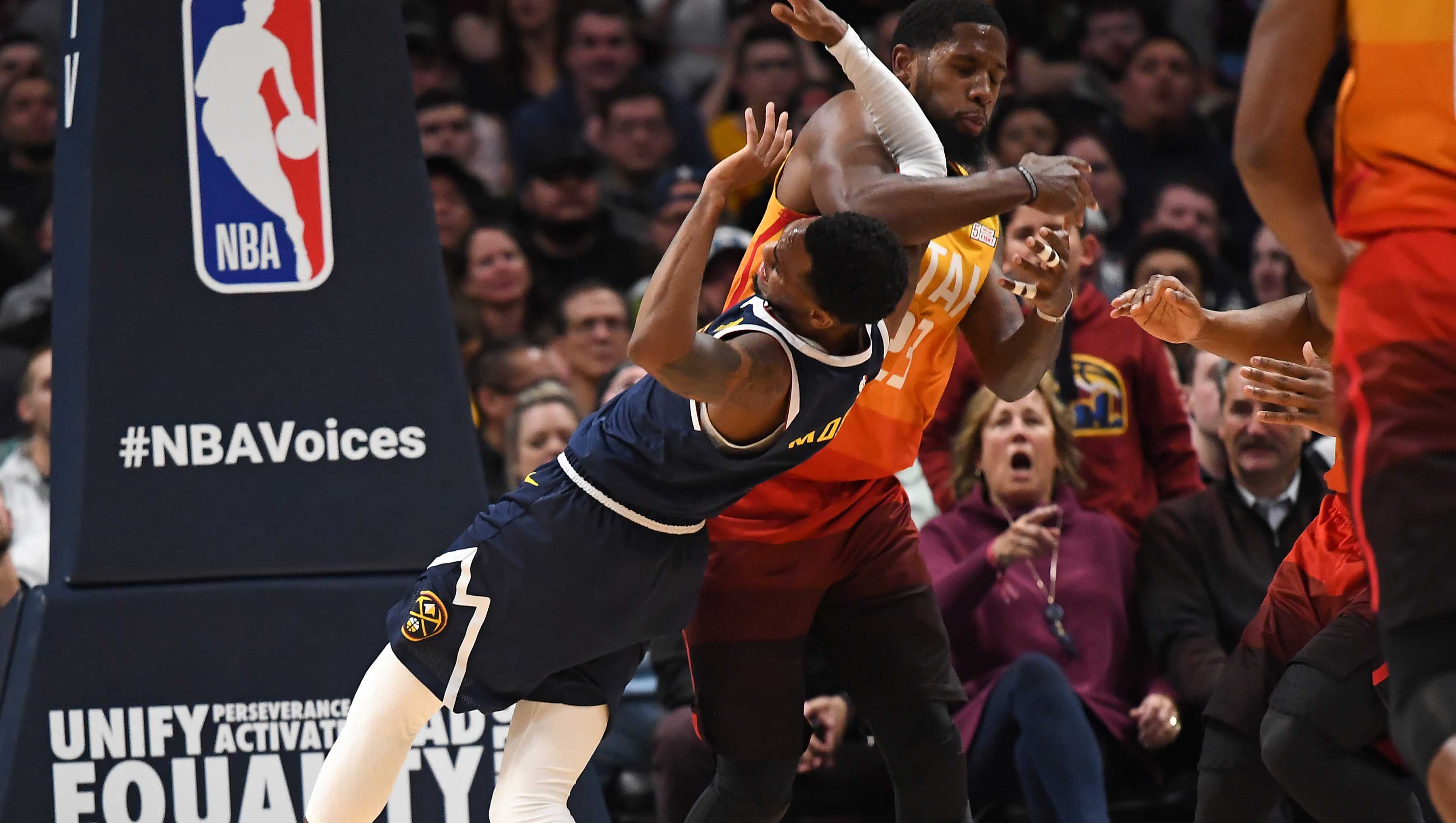 NBA: Utah Jazz at Denver Nuggets Denver Nuggets guard Monte Morris (11) is elbowed by Utah Jazz forward Royce O'Neale (23) in the second quarter at the Pepsi Center.
