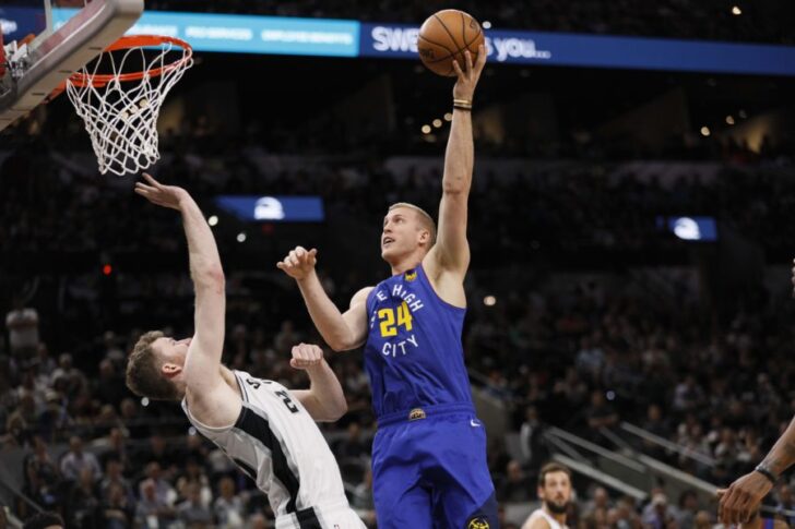019; San Antonio, TX, USA; Denver Nuggets power forward Mason Plumlee (24) shoots the ball over San Antonio Spurs center Jakob Poeltl (25) in game six of the first round of the 2019 NBA Playoffs at AT&T Center.