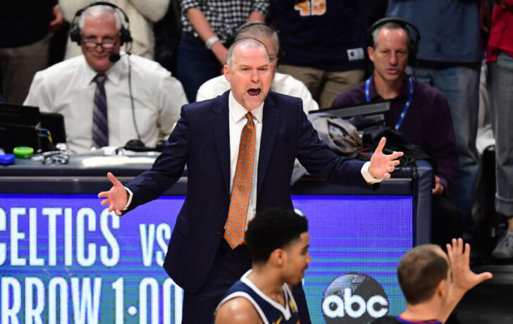 Denver Nuggets head coach Michael Malone reacts to a foul called in the fourth quarter against the San Antonio Spurs in game seven of the first round of the 2019 NBA Playoffs at the Pepsi Center.