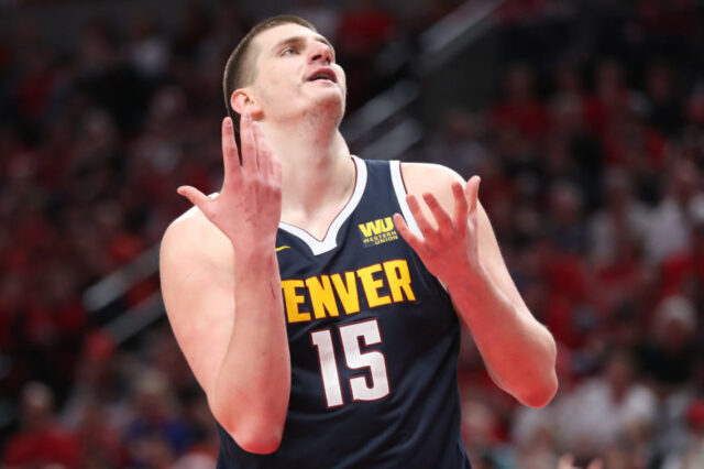 Denver Nuggets center Nikola Jokic (15) reacts after the Nuggets were called for a foul against the Portland Trail Blazers in the second half of game four of the second round of the 2019 NBA Playoffs at Moda Center.