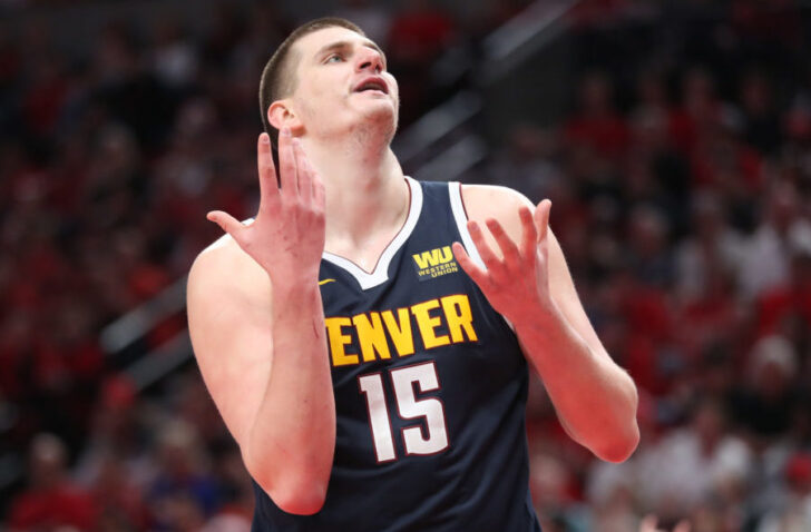 Denver Nuggets center Nikola Jokic (15) reacts after the Nuggets were called for a foul against the Portland Trail Blazers in the second half of game four of the second round of the 2019 NBA Playoffs at Moda Center.