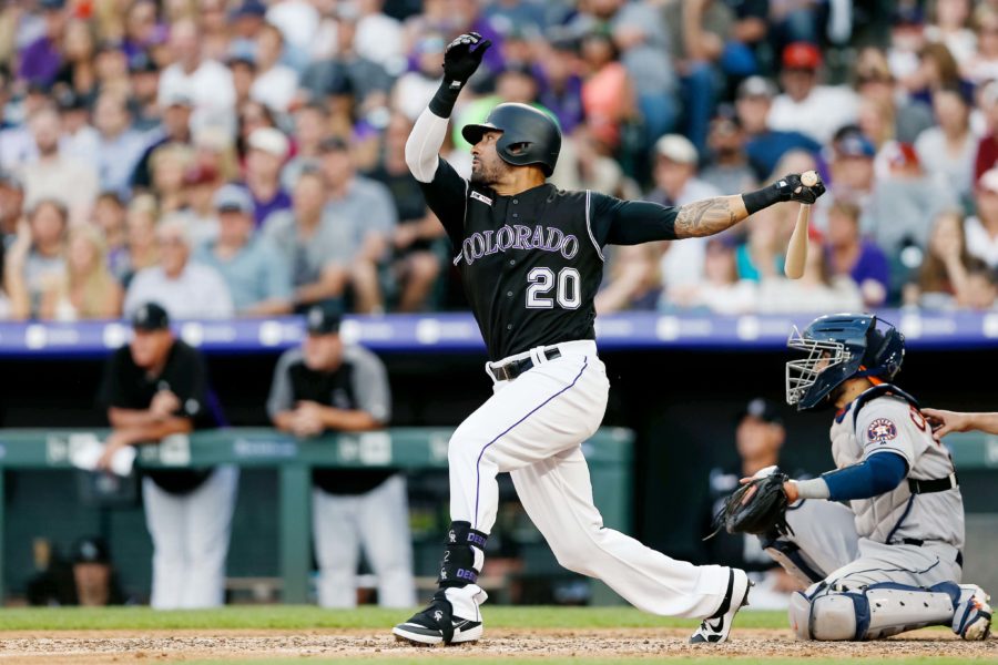 Colorado Rockies' Ian Desmond bats against the Washington