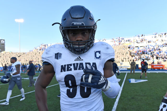 Nevada Wolf Pack linebacker Malik Reed (90) celebrates the win over the Air Force Falcons at Falcon Stadium.