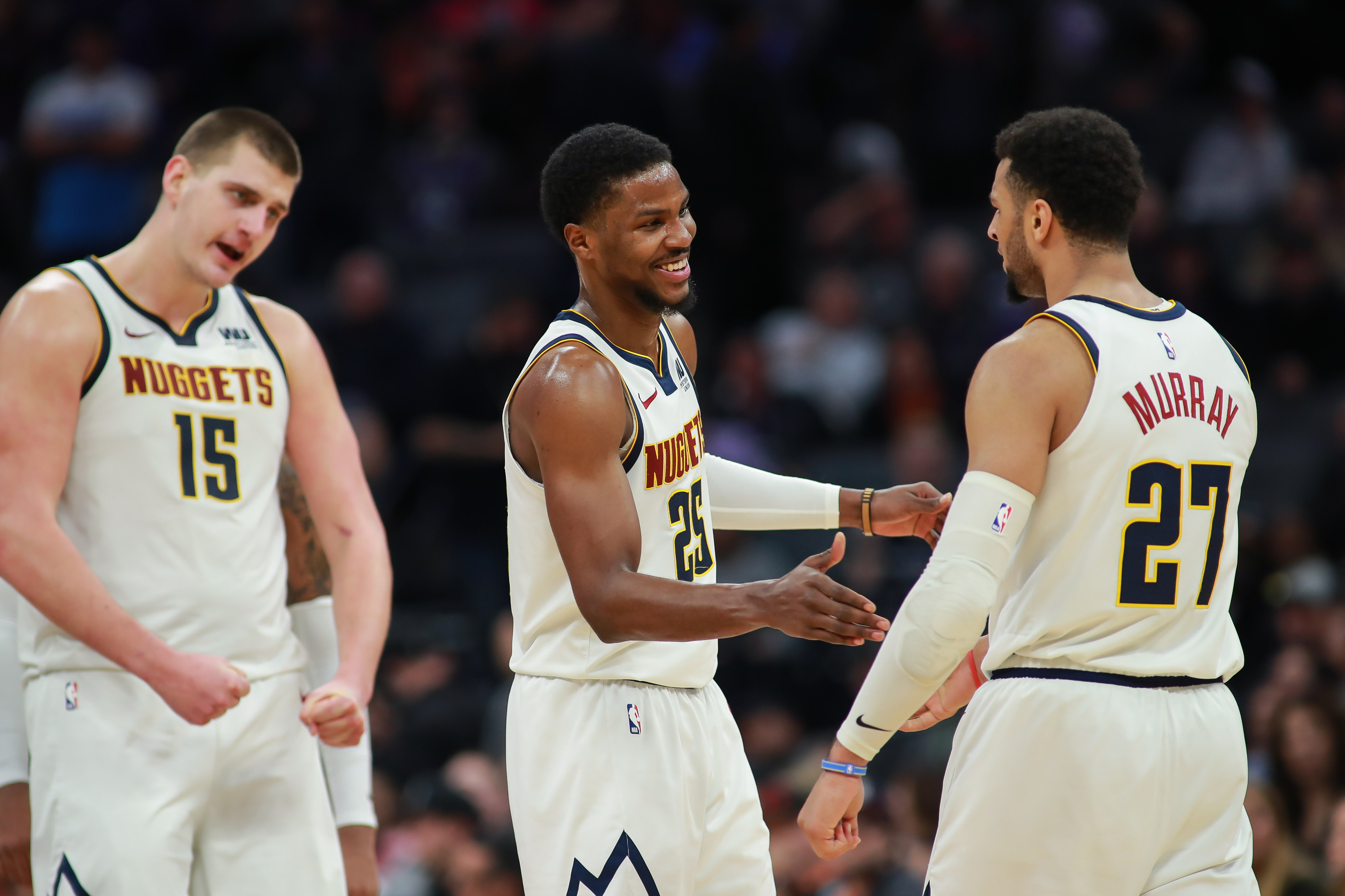 NBA: Denver Nuggets at Sacramento Kings Denver Nuggets guard Jamal Murray (27) celebrates with guard Malik Beasley (25) and center Nikola Jokic (15) during the fourth quarter against the Sacramento Kings at Golden 1 Center.