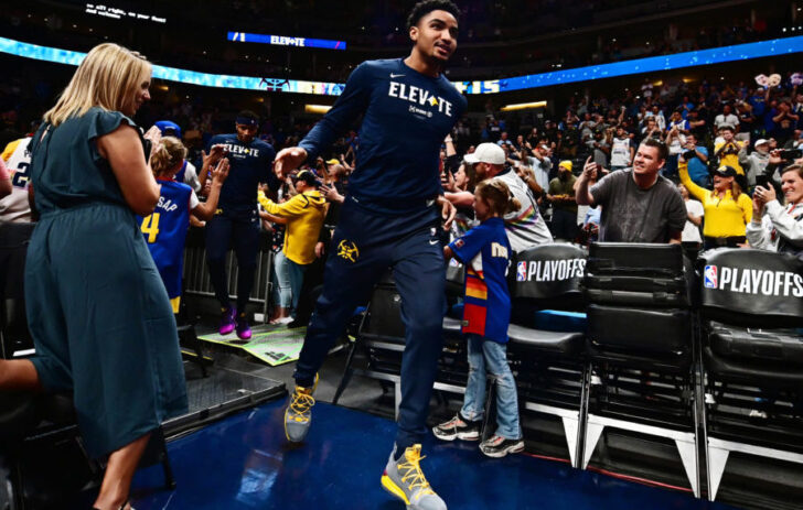 Denver Nuggets guard Gary Harris (14) runs onto the court for warm ups before the game against the Portland Trail Blazers in game seven of the second round of the 2019 NBA Playoffs at Pepsi Center.