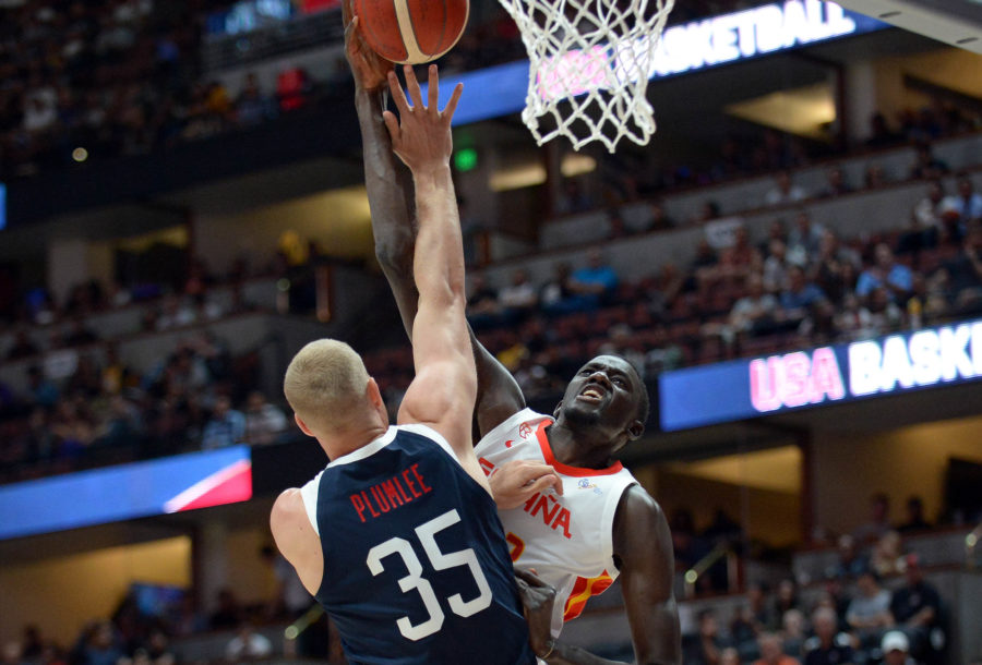 Spain center Ilimane Diop (12) moves to the basket against USA center Mason Plumlee (35) during the first half of an exhibition game at Honda Center.