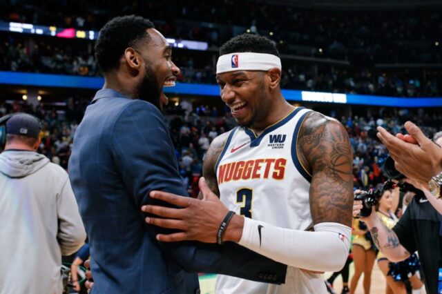 Denver Nuggets forward Torrey Craig (3) celebrates with guard Will Barton after the game against the Toronto Raptors at the Pepsi Center.