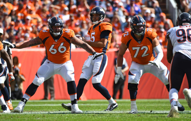 Denver Broncos offensive tackle Dalton Risner (66) and offensive tackle Garett Bolles (72) block for quarterback Joe Flacco (5) in the fourth quarter against the Chicago Bears at Empower Field at Mile High.