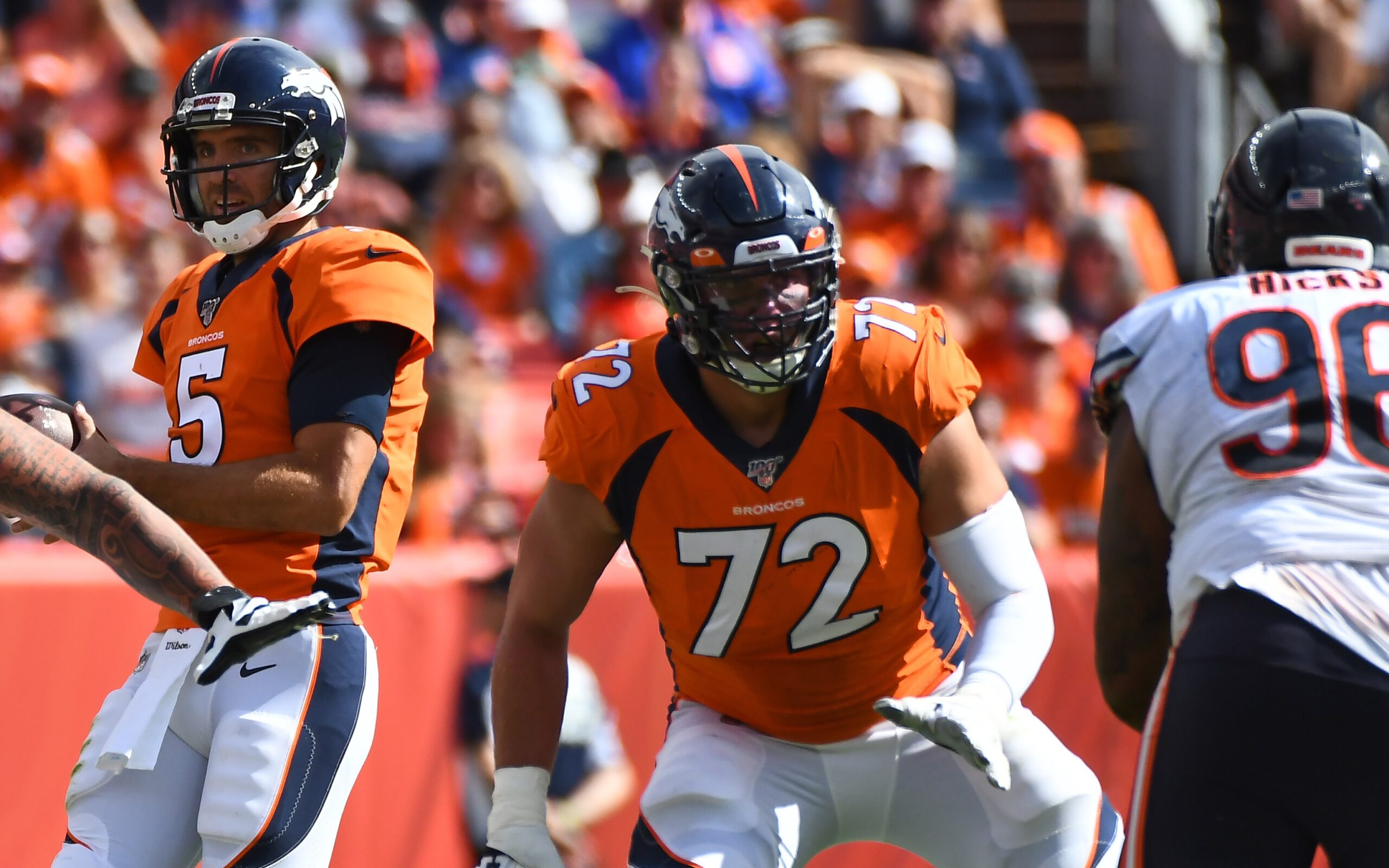 Denver Broncos tackle Tyler Polumbus takes part in drills during