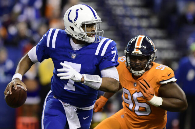 Indianapolis quarterback Jacoby Brissett (17) runs out of the pocket in the fourth quarter against the Denver Broncos at Lucas Oil Stadium.