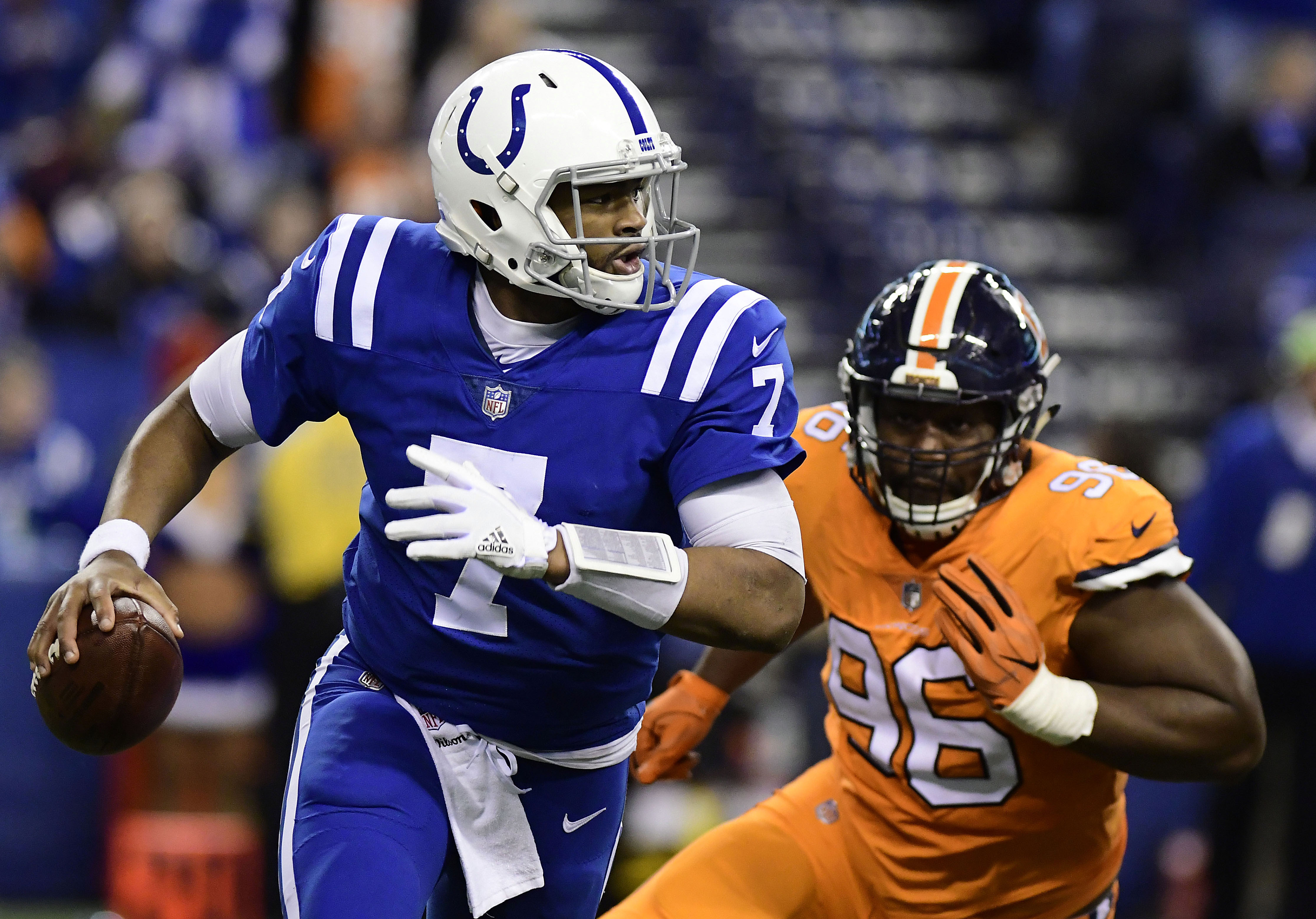 NFL: Denver Broncos at Indianapolis Colts Indianapolis quarterback Jacoby Brissett (17) runs out of the pocket in the fourth quarter against the Denver Broncos at Lucas Oil Stadium.