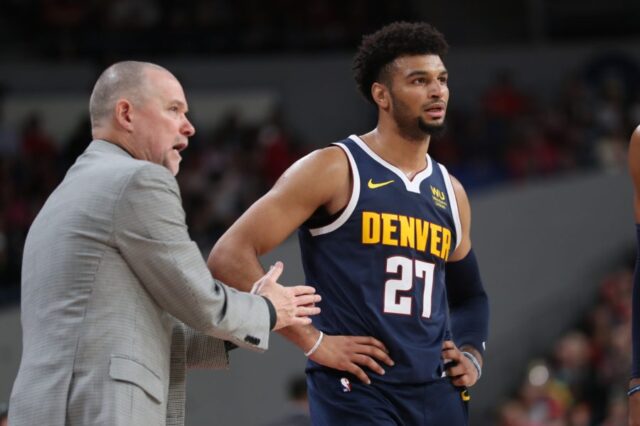 Denver Nuggets head coach Michael Malone talks with guard Jamal Murray (27) in the second half at Veterans Memorial Coliseum.