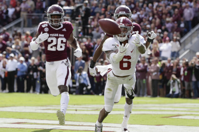 Alabama wide receiver DeVonta Smith (6) misses a pass from quarterback Tua Tagovailoa in the first quarter against Texas A&M at Kyle Field.
