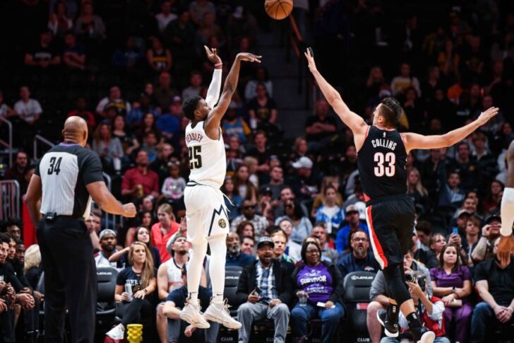 Denver Nuggets guard Malik Beasley (25) takes a shot over Portland Trail Blazers forward Zach Collins (33) during the first half at Pepsi Center.