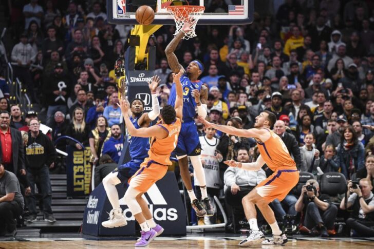 Denver Nuggets forward Torrey Craig (3) blocks a shot by Phoenix Suns guard Devin Booker (1) to secure the win in overtime at Pepsi Center.