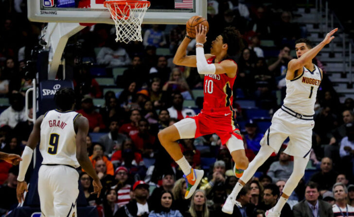 New Orleans Pelicans center Jaxson Hayes (10) shoots over Denver Nuggets forward Michael Porter Jr. (1) during the first quarter at the Smoothie King Center