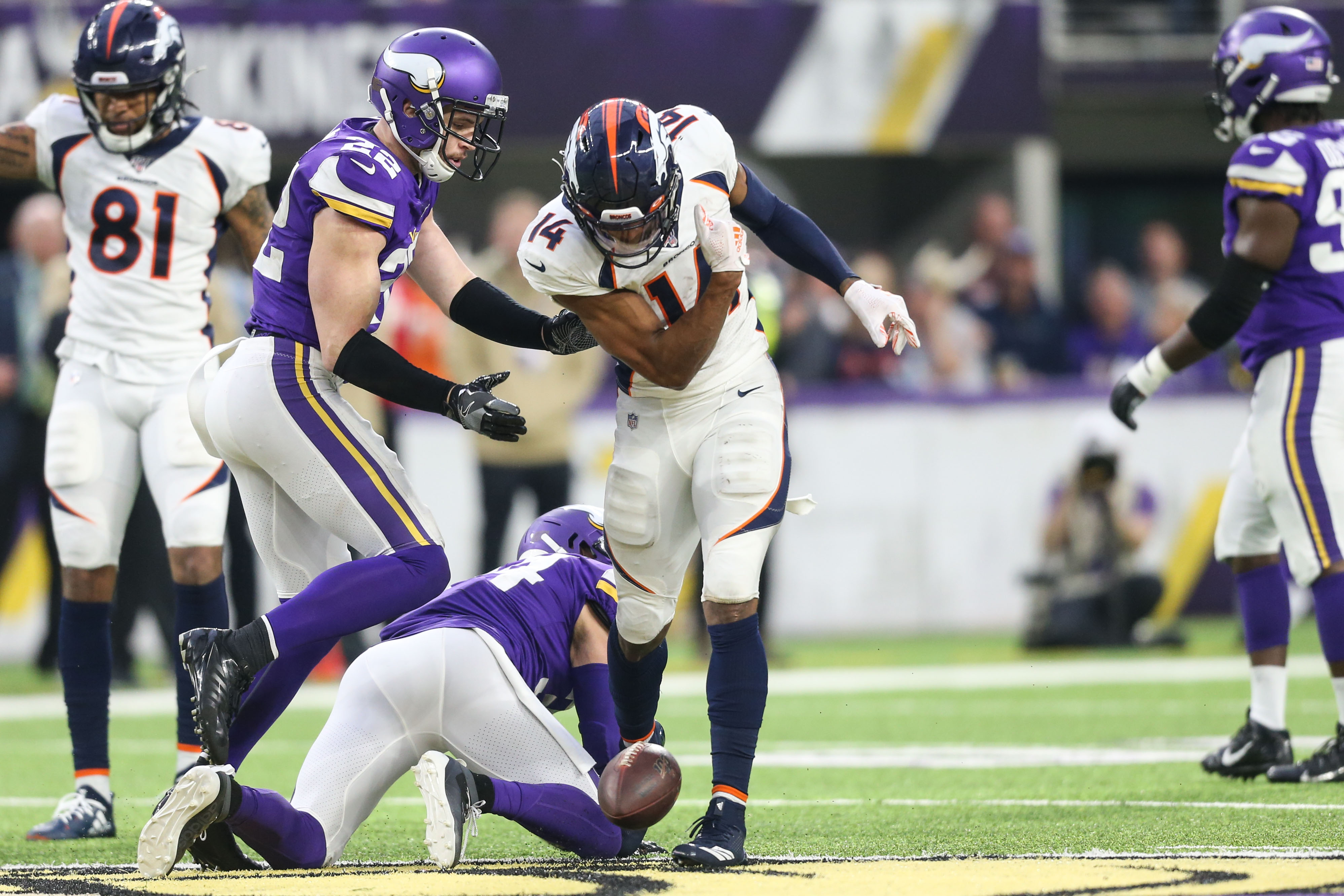 Denver Broncos wide receiver Courtland Sutton (14) celebrates after gaining a first down against the Minnesota Vikings during the third quarter at U.S. Bank Stadium