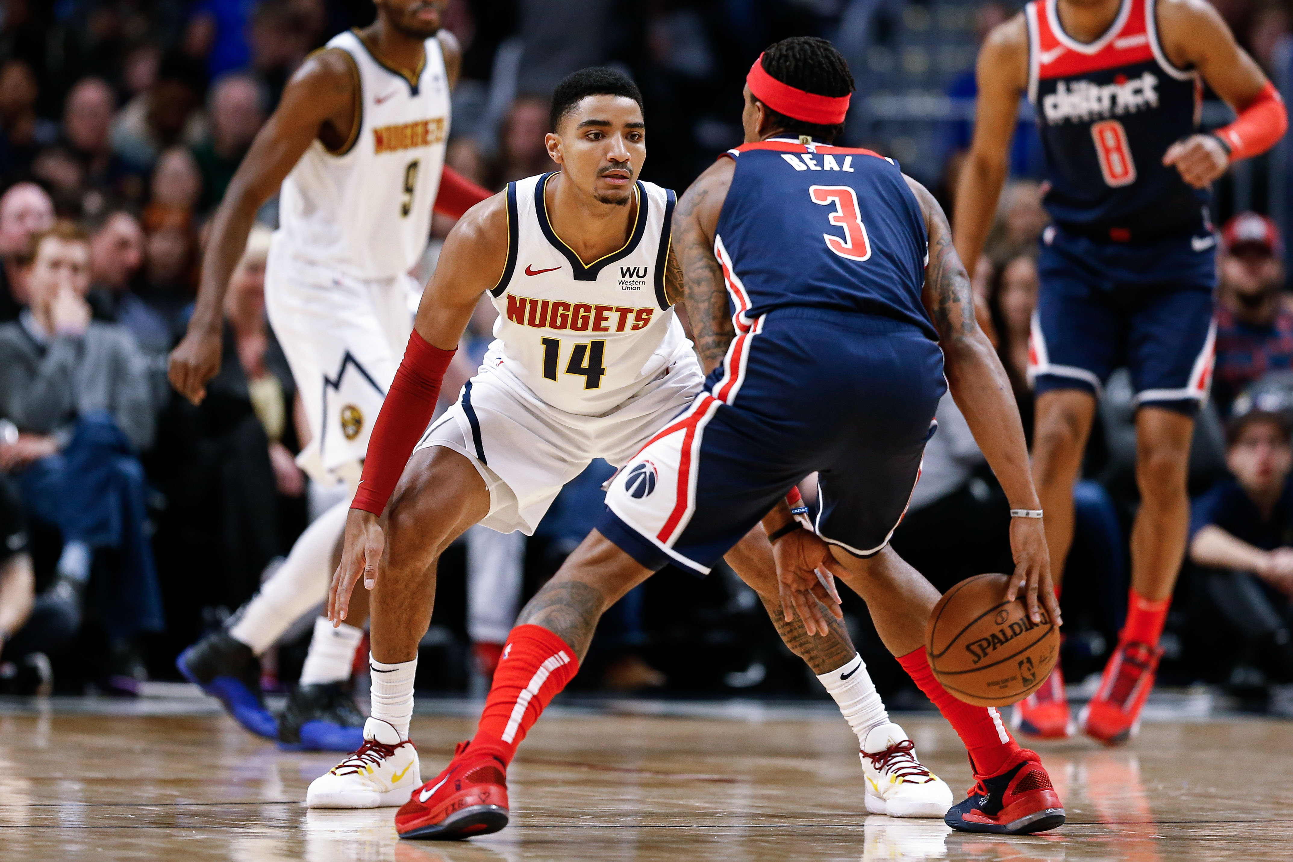 NBA: Washington Wizards at Denver Nuggets Washington Wizards guard Bradley Beal (3) controls the ball as Denver Nuggets guard Gary Harris (14) guards in the second quarter at the Pepsi Center.