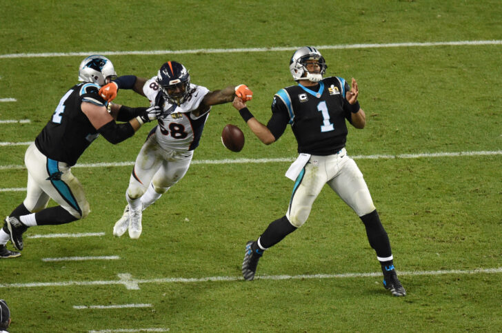 Denver Broncos wide receiver Demaryius Thomas (88) knocks the ball from Carolina Panthers quarterback Cam Newton's (1) hand for a fumble in Super Bowl 50 at Levi's Stadium.