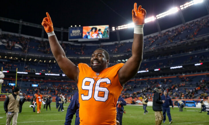 Defensive end Shelby Harris #96 of the Denver Broncos walks off the field celebrating after the Denver Broncos 24-17 win over the Pittsburgh Steelers at Broncos Stadium at Mile High on November 25, 2018 in Denver, Colorado.