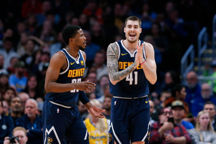 Denver Nuggets forward Juancho Hernangomez (41) reacts with guard Malik Beasley (25) after a play in the second quarter against the Dallas Mavericks at the Pepsi Center.