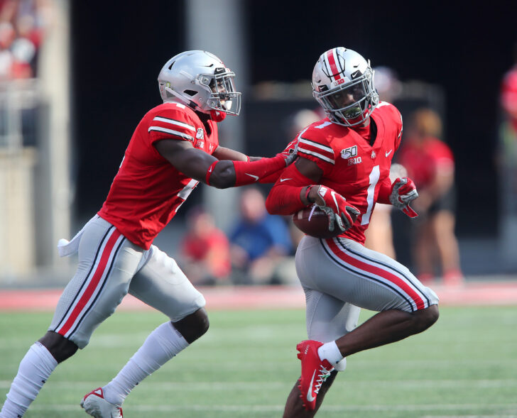 Ohio State Buckeyes cornerback Jeff Okudah (1) is congratulated by safety Jordan Fuller (4) following his interception during the first half against the Miami (Oh) Redhawks at Ohio Stadium.