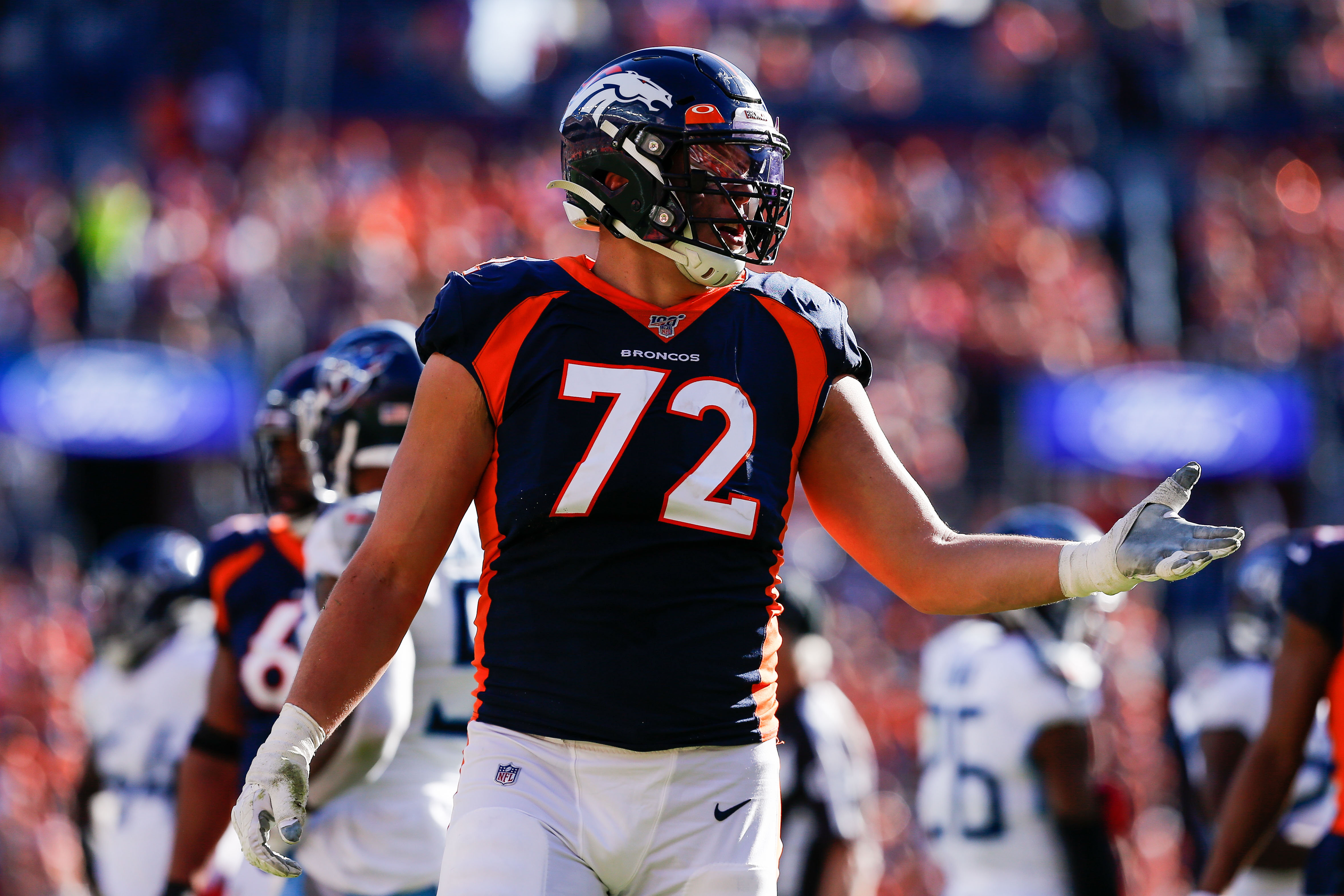 Denver Broncos offensive tackle Garett Bolles (72) reacts after receiving a penalty in the second quarter against the Tennessee Titans at Empower Field at Mile High.