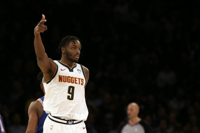 Denver Nuggets forward Jerami Grant (9) reacts after making a basket against the New York Knicks during the second half at Madison Square Garden.