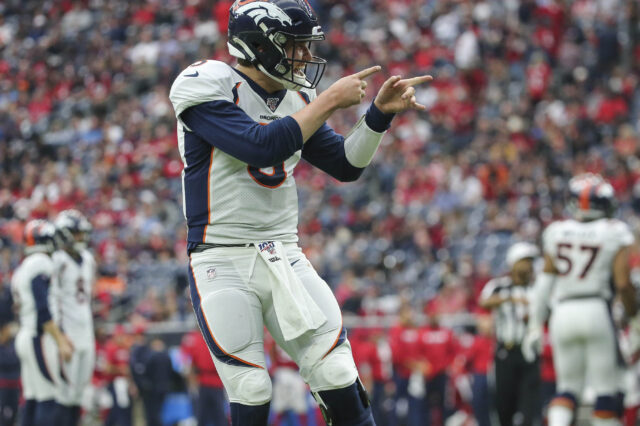 Denver Broncos quarterback Drew Lock (3) reacts after a touchdown by running back Phillip Lindsay (not pictured) during the third quarter against the Houston Texans at NRG Stadium.