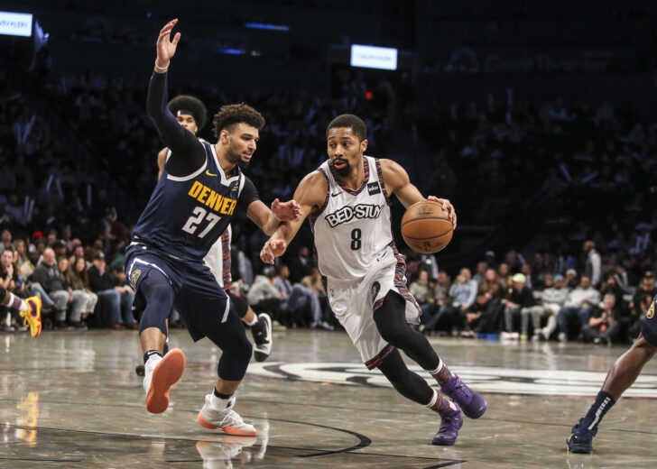 Brooklyn Nets guard Spencer Dinwiddie (8) looks to drive past Denver Nuggets guard Jamal Murray (27) in the fourth quarter at Barclays Center.