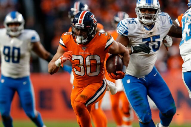 Phillip Lindsay runs away from the Lions. Credit: Isiah J. Downing, USA TODAY Sports.
