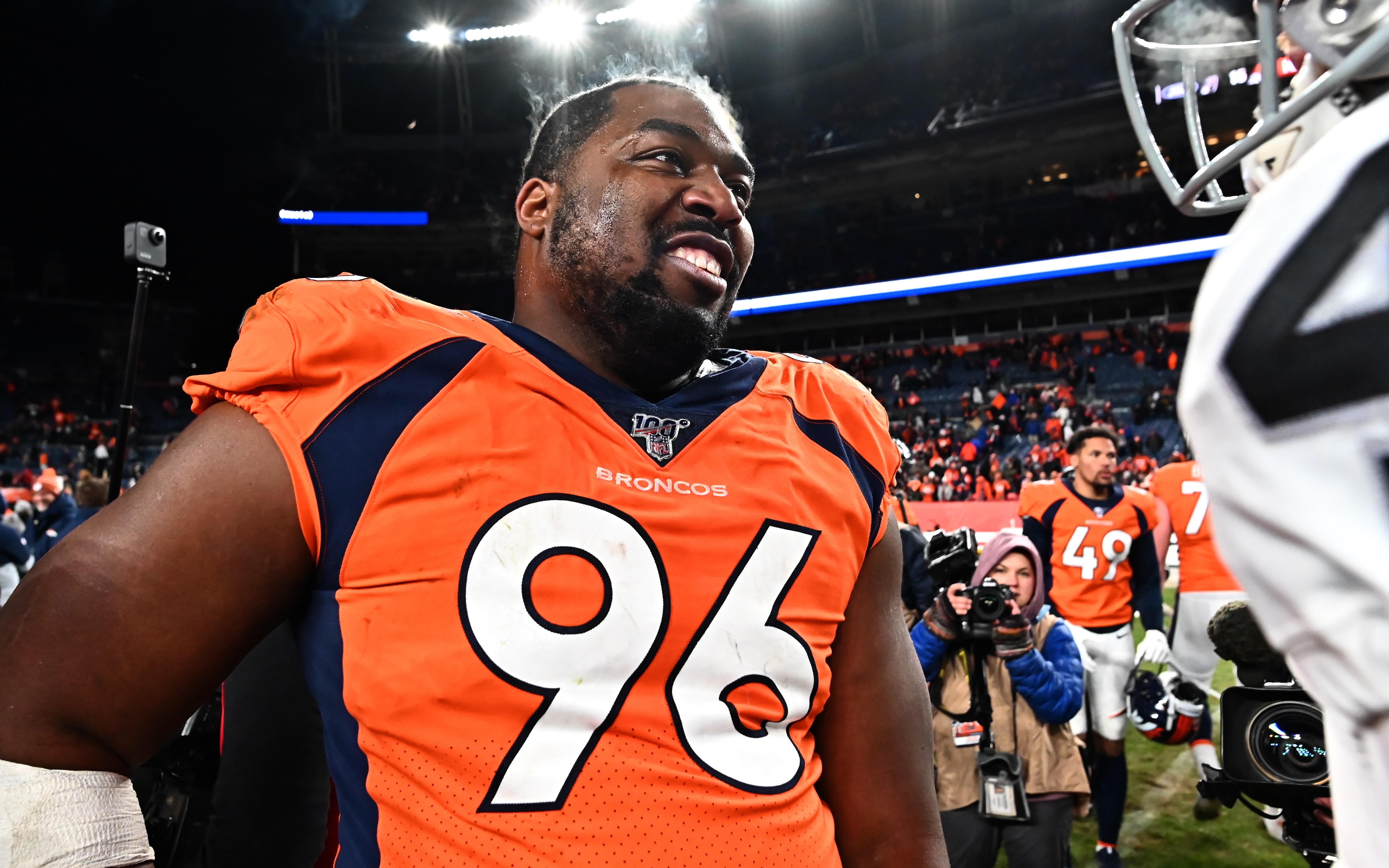 USATSI_13851235 Cropped Shelby Harris celebrates the Broncos win over the Raiders. Credit: Ron Chenoy, USA TODAY Sports.