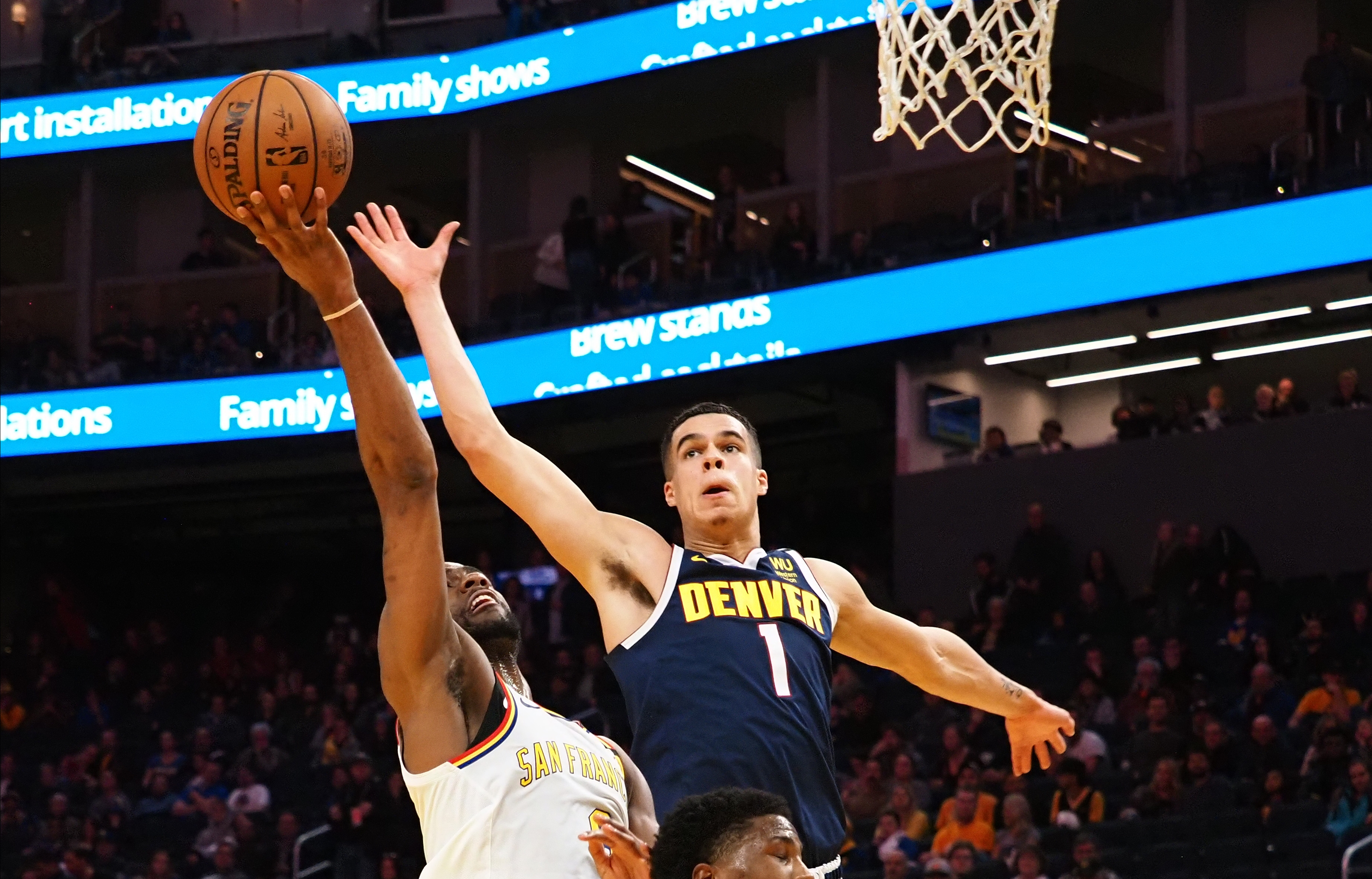 Denver Nuggets forward Michael Porter Jr. (1) defends the shot by Golden State Warriors guard Alec Burks (8) during the overtime period at Chase Center.