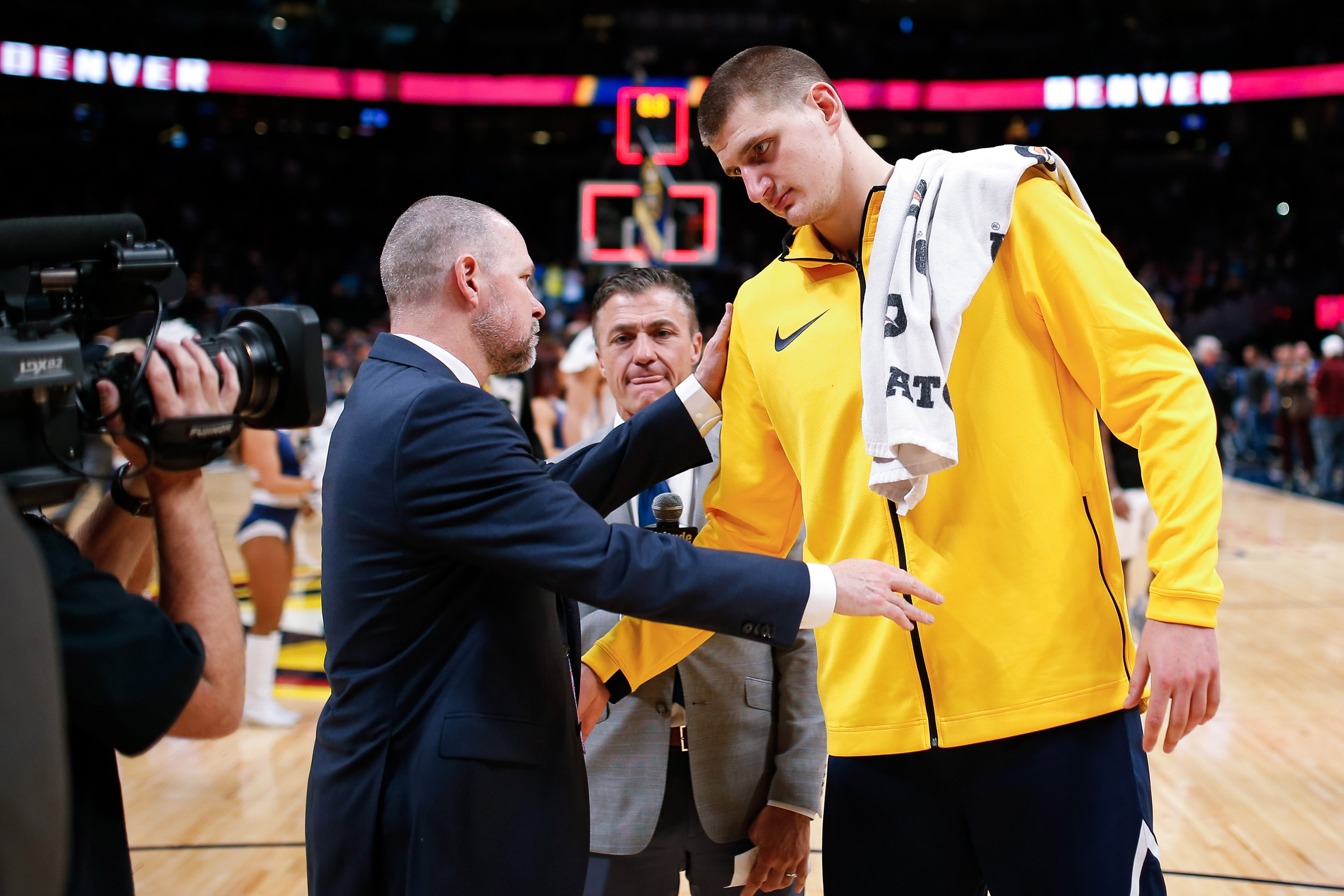 NBA: Phoenix Suns at Denver Nuggets Denver Nuggets head coach Michael Malone congratulates center Nikola Jokic (15) after the game against the Phoenix Suns at the Pepsi Center.