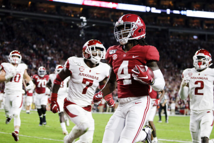 Alabama Crimson Tide wide receiver Jerry Jeudy (4) carries the ball in for a touchdown during the first half of an NCAA college football game against the Arkansas Razorbacks at Bryant-Denny Stadium.