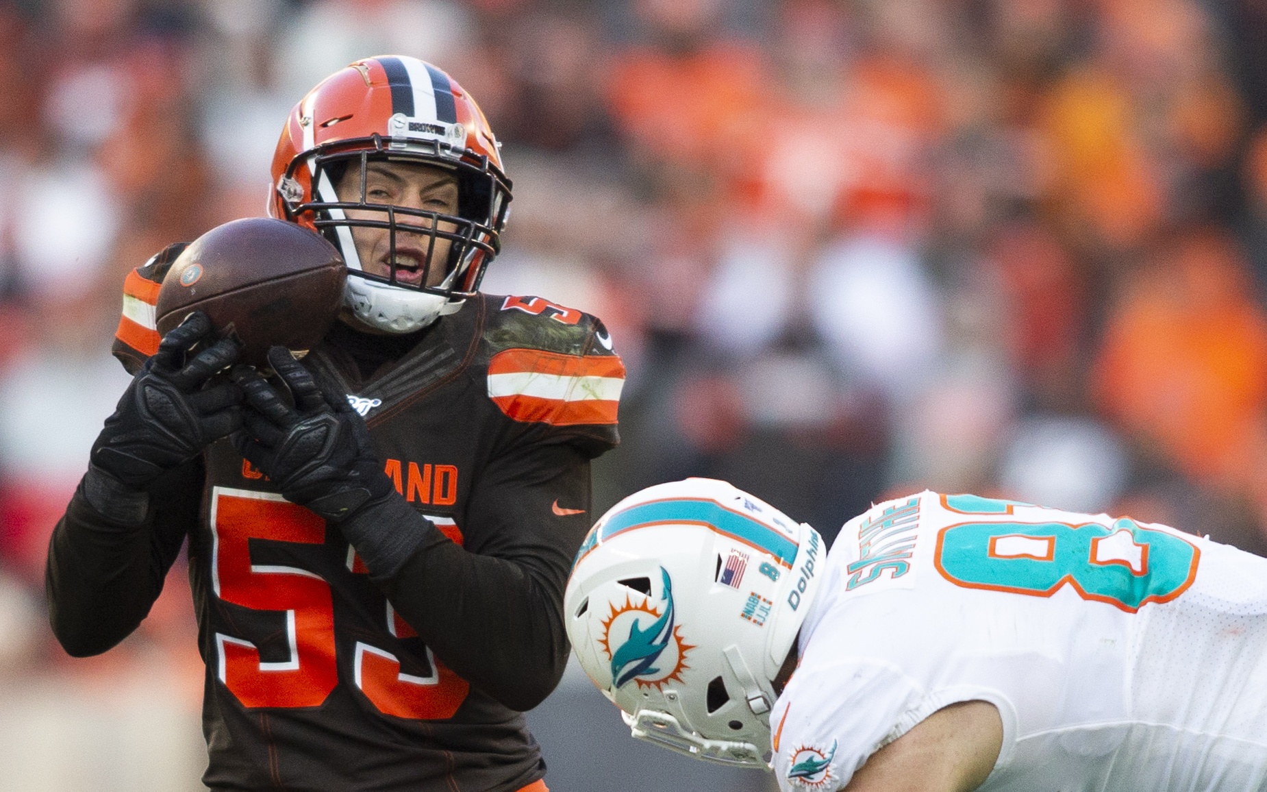 USATSI_13707738 Cropped Joe Schobert picks off a pass. Credit: Scott Galvin, USA TODAY Sports.