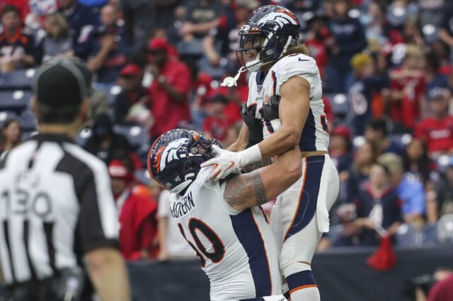 McGovern lifts Phillip Lindsay in celebration. Credit: Troy Taormina, USA TODAY Sports.