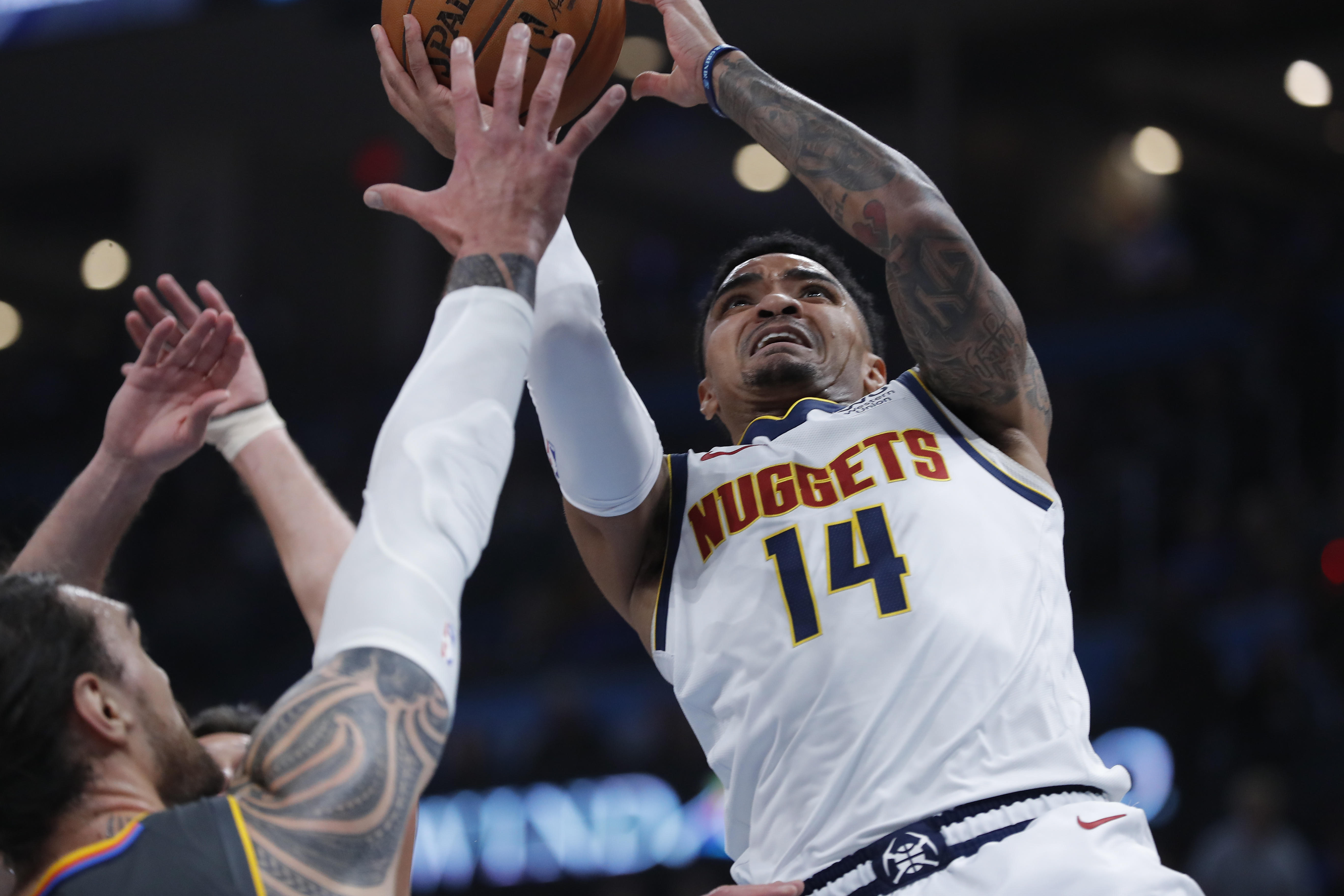 NBA: Denver Nuggets at Oklahoma City Thunder Denver Nuggets guard Gary Harris (14) drives to the goal against Oklahoma City Thunder center Steven Adams (12) during the first quarter at Chesapeake Energy Arena.