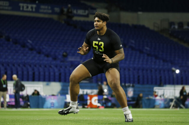 Iowa Hawkeyes offensive lineman Tristan Wirfs (OL53) goes through a workout drill during the 2020 NFL Combine at Lucas Oil Stadium.