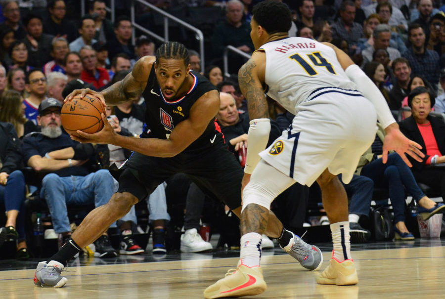 NBA: Denver Nuggets at Los Angeles Clippers os Angeles Clippers forward Kawhi Leonard (2) controls the ball against Denver Nuggets guard Gary Harris (14) during the second half at Staples Center.